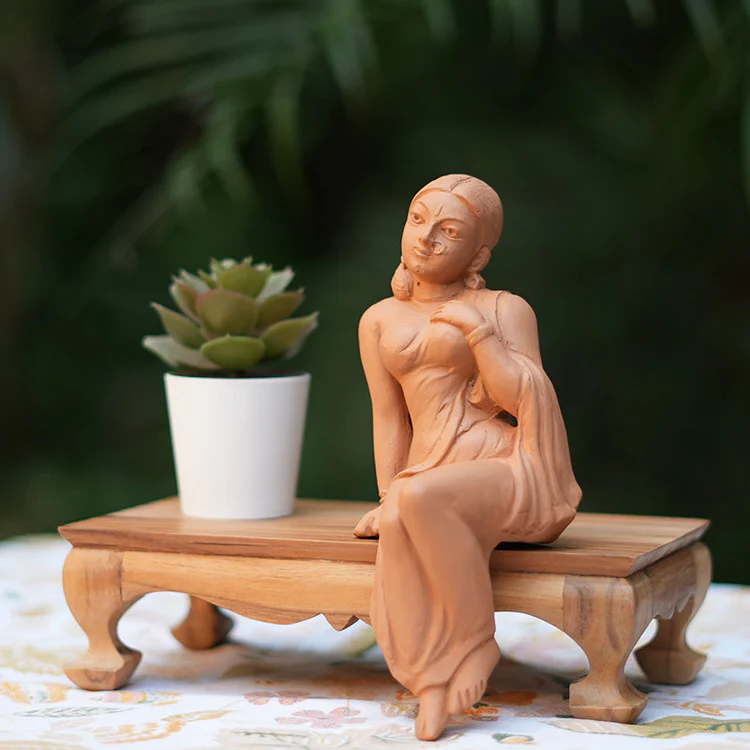 FIGURINE OF A RELAXING 'NAEKA' BENGALI WOMAN